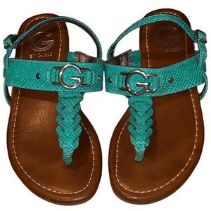 Good condition G by guess 5 1/2 aqua, brown for the platform & silver for the G